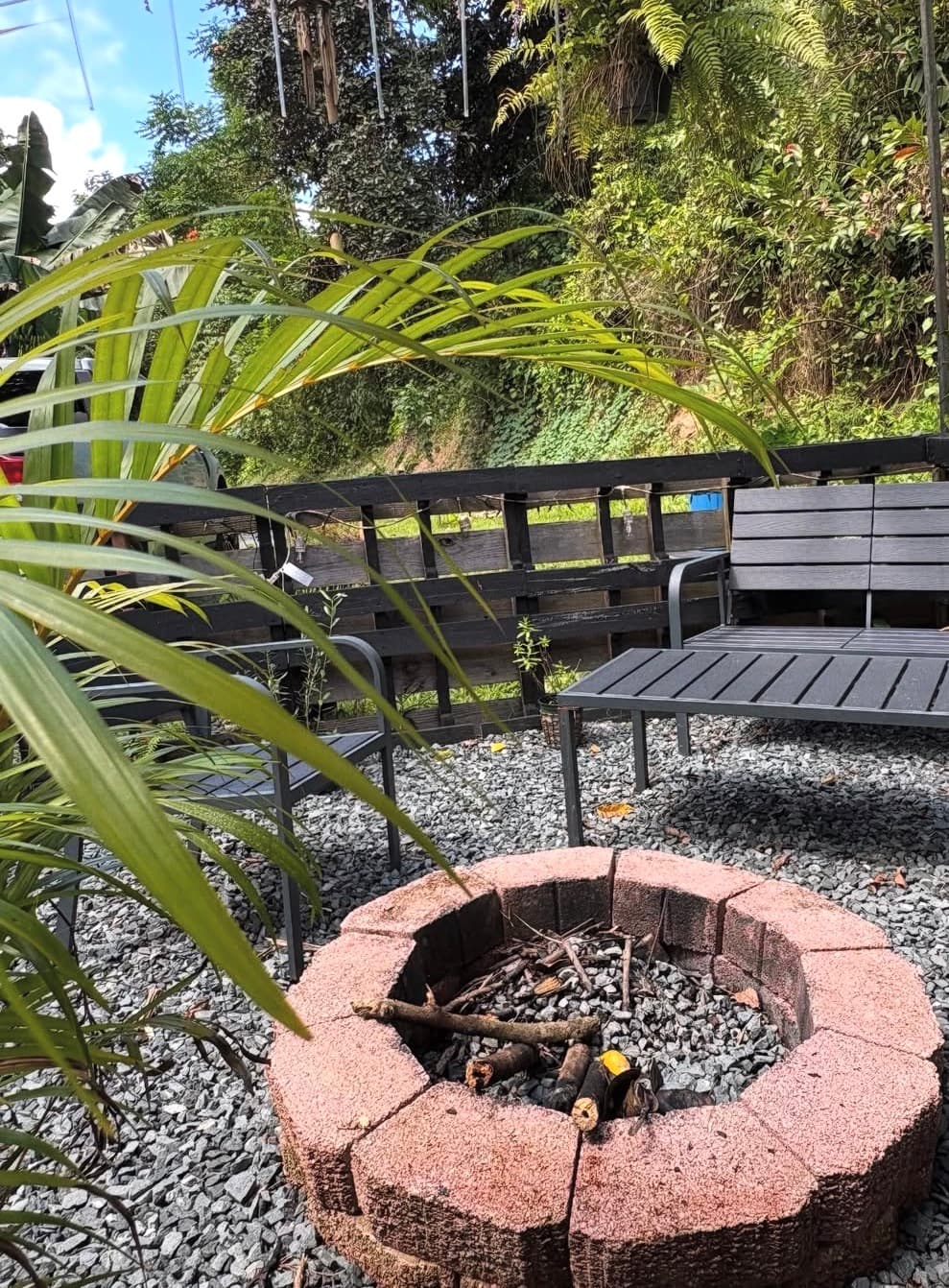 A garden seating area and fire pit